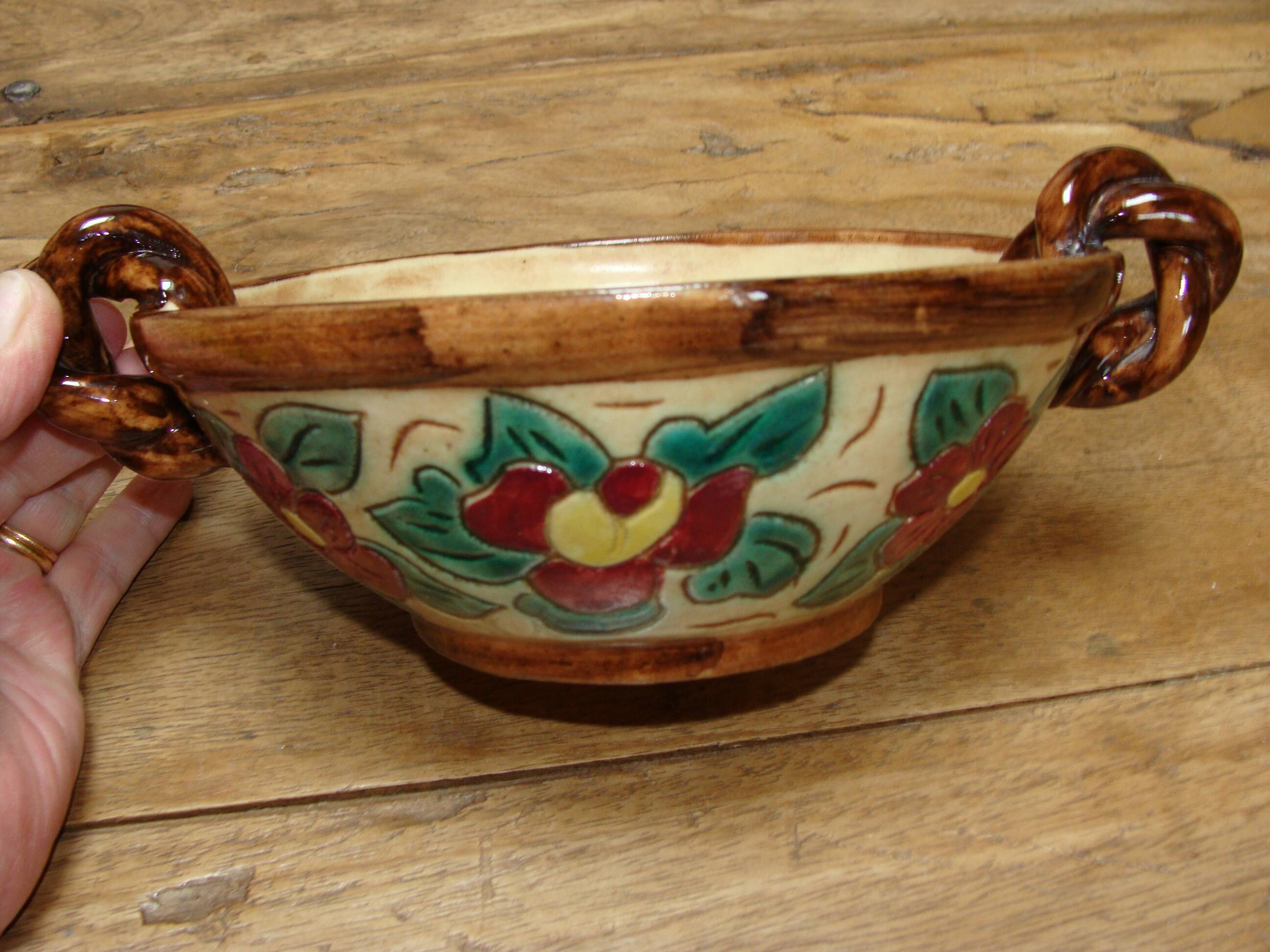 Antique engraved and enamelled ceramic cup