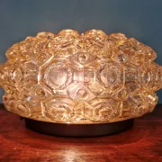 Amber glass honeycomb ceiling light, design by Helena Tynell, 1970.