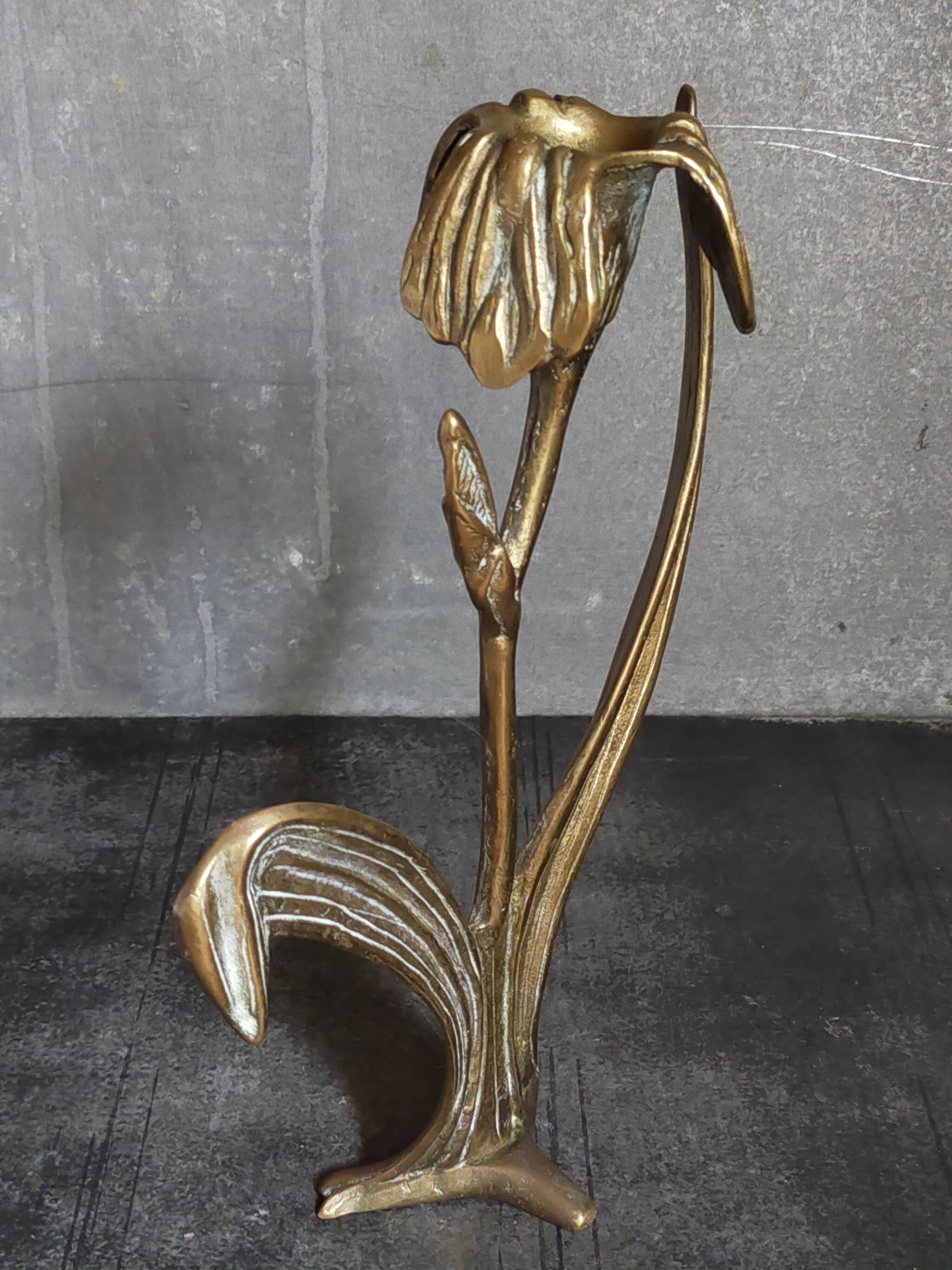 Old iris flower candle holder in solid brass