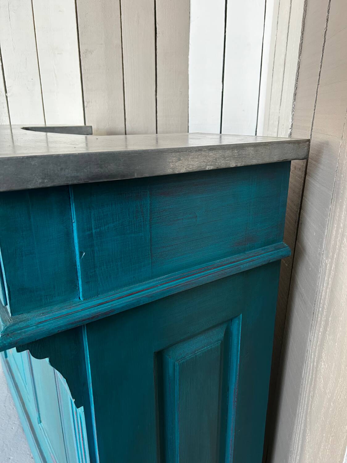 Old wooden trade counter with a zinc top.