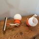 Pair of Space Age design wall lights in metal and vintage opaline.
