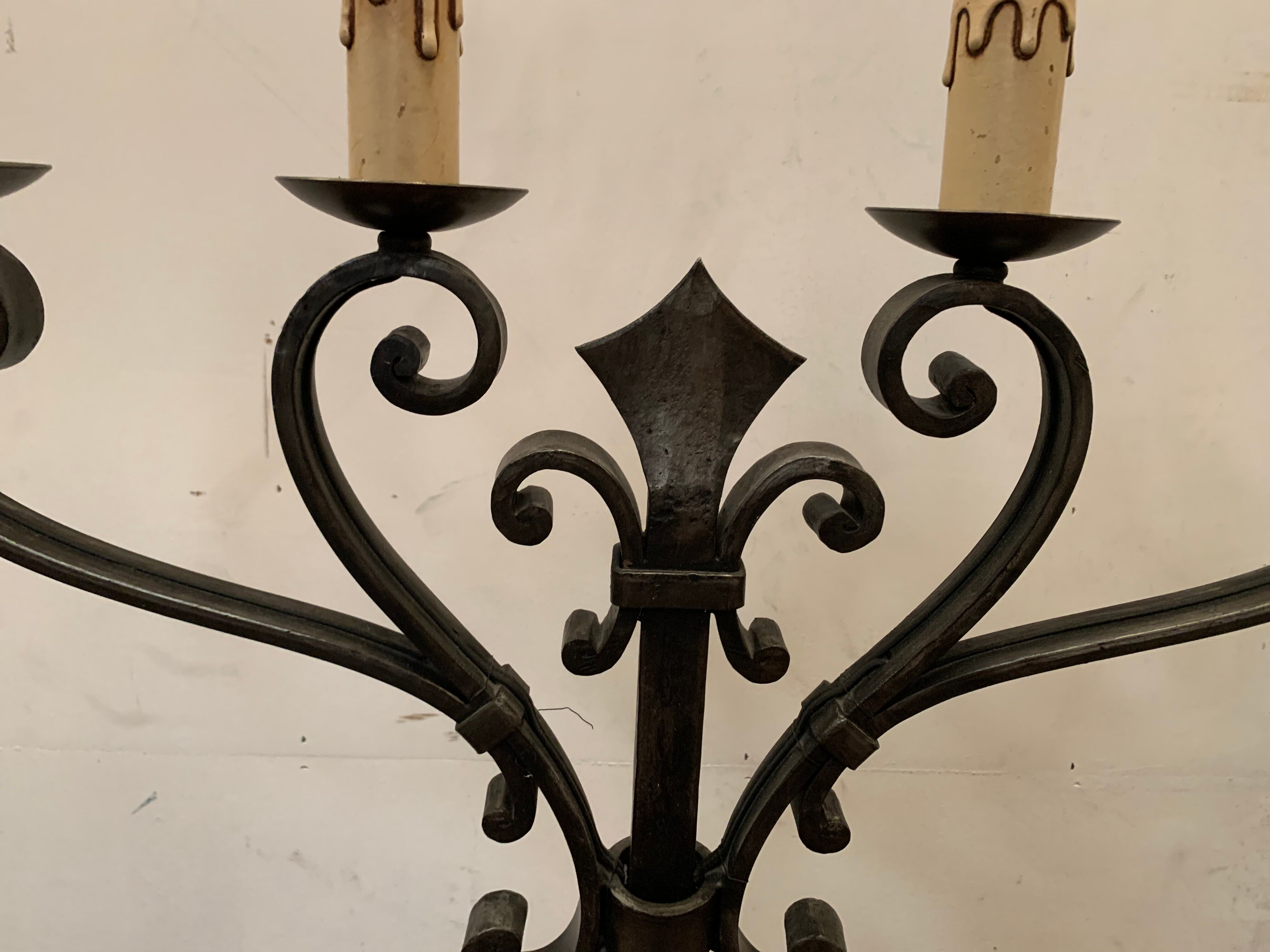 Floor lamp has four wrought iron lights