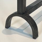 Pair of modernist fire dogs in wrought iron and brass