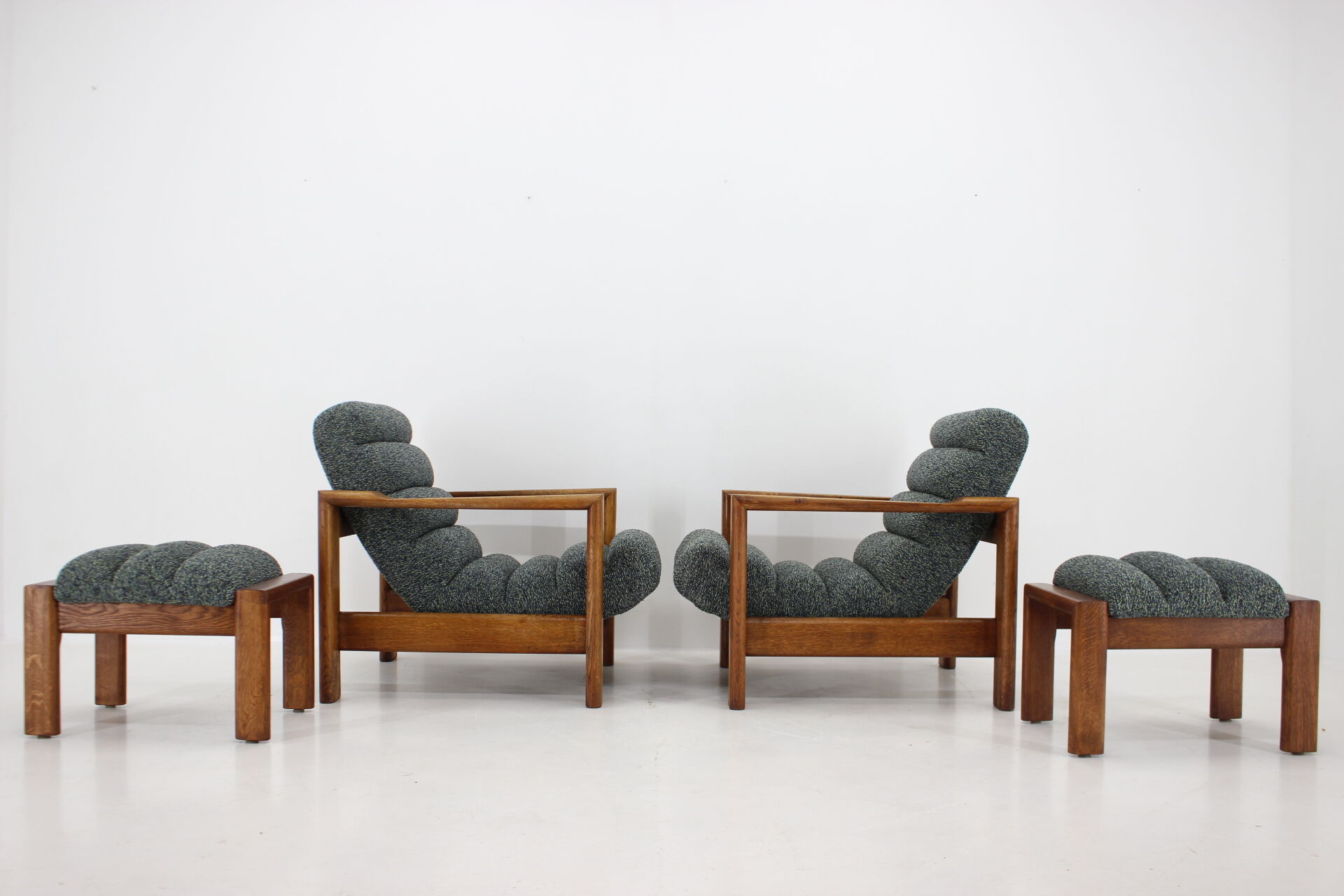 1960s pair of armchairs with stools in oak, Finland