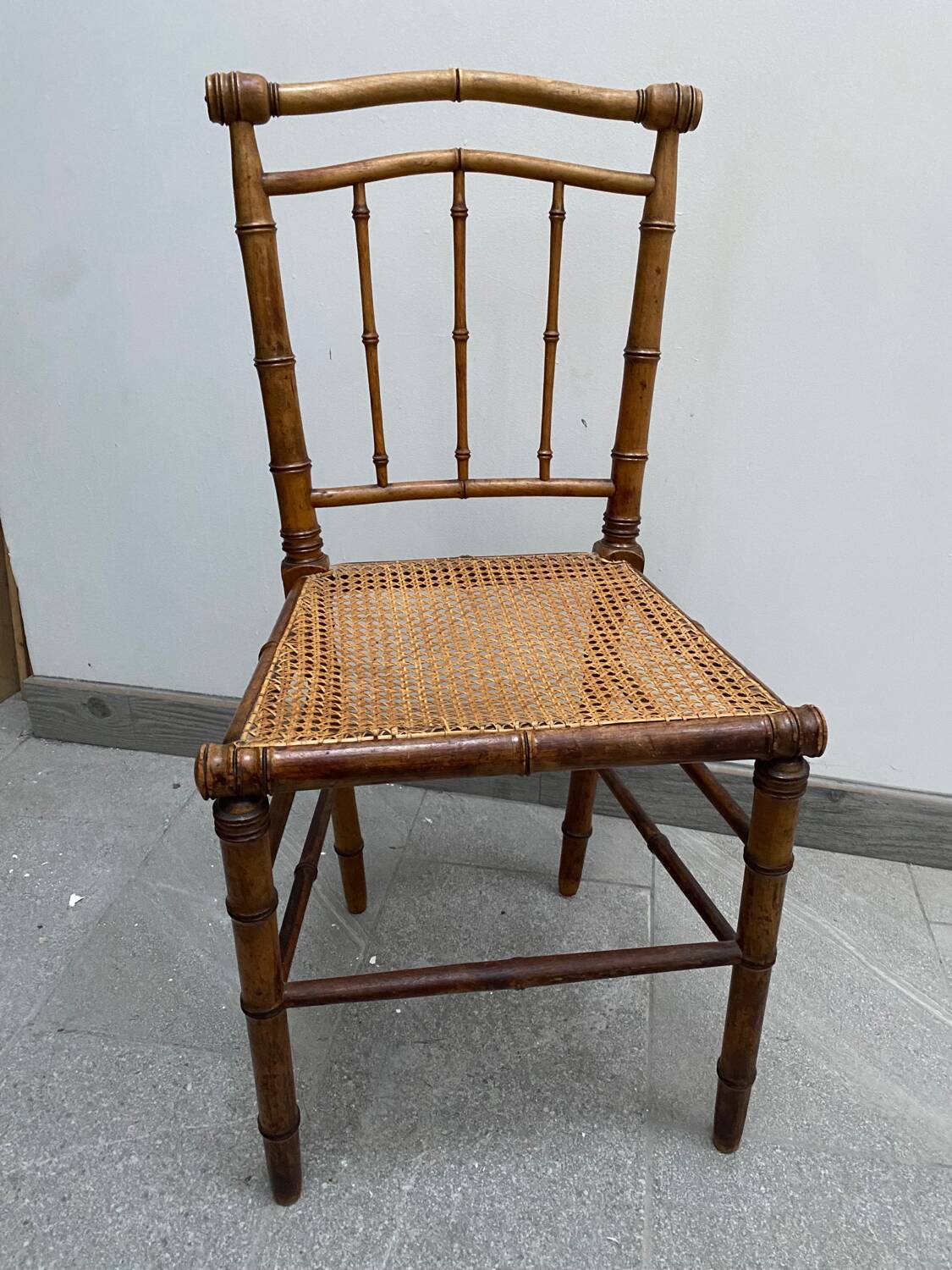Old bamboo imitation cane chair