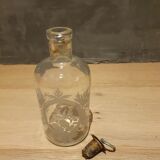 Bottle engraved with acid
