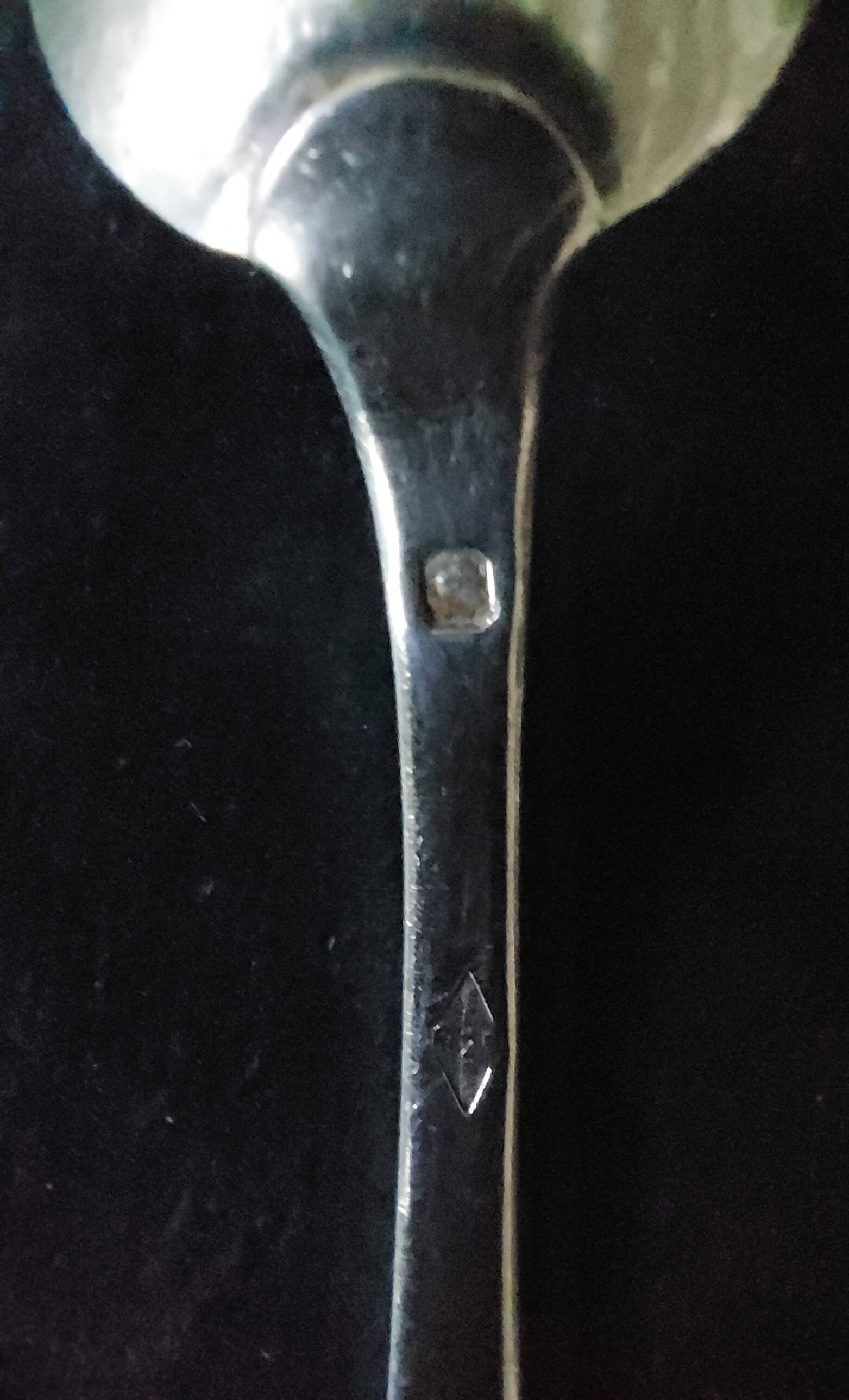 Small silver spoon with Minerva hallmark and silversmith's mark Maitreau, late 19th century.