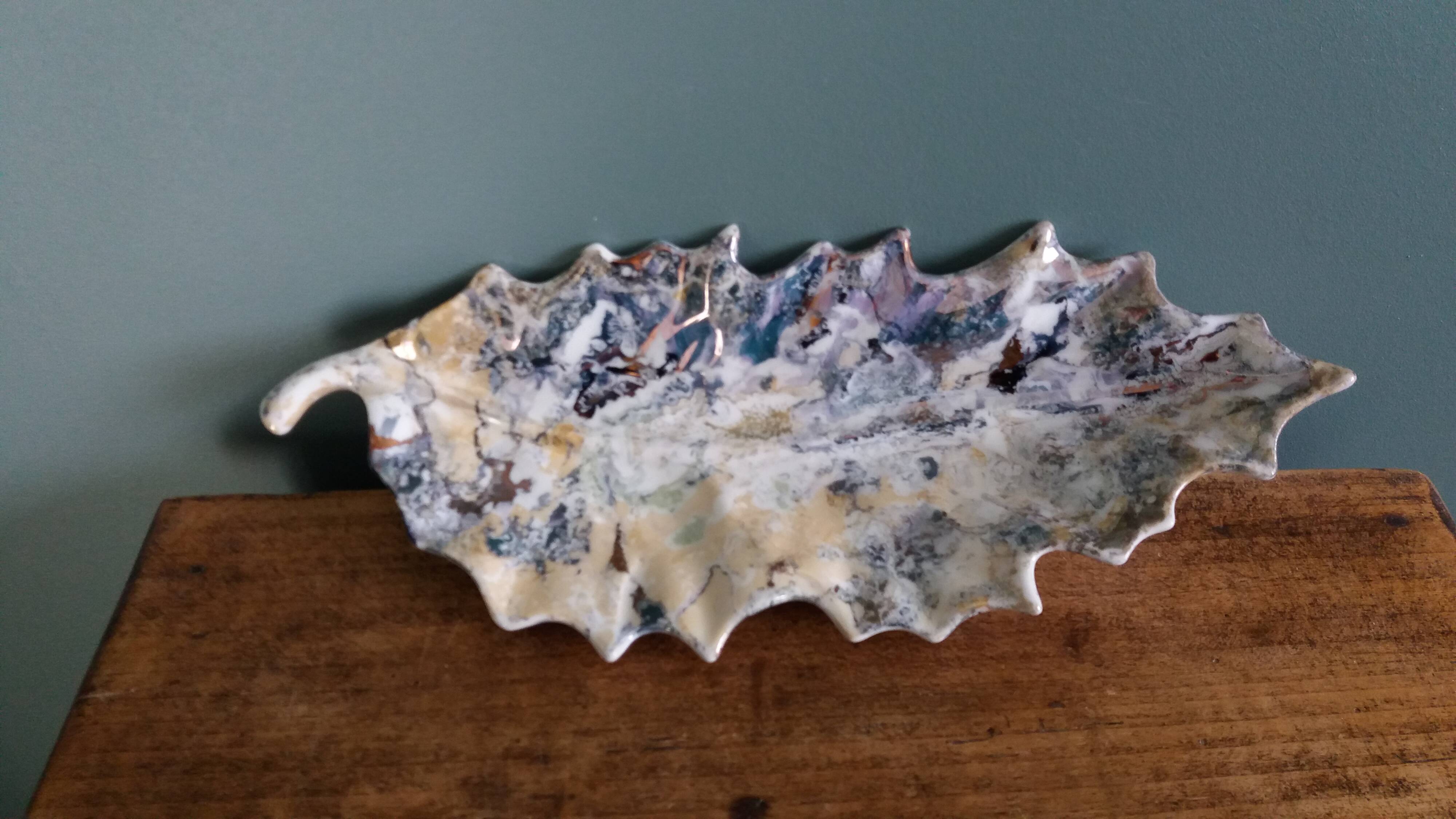 Iridescent enamelled leaf catchall, signed Gfredy.