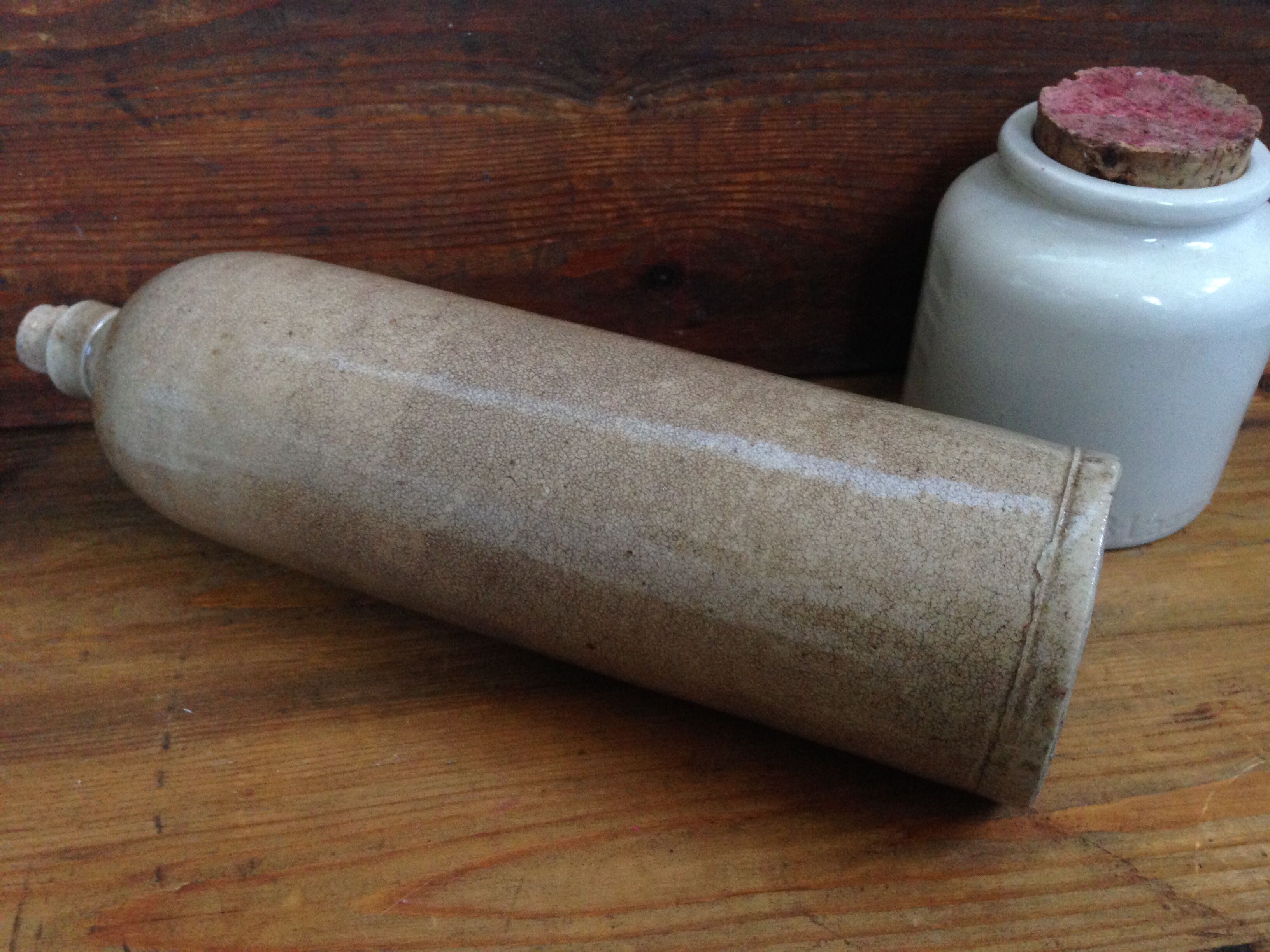 Enamelled stoneware bottle