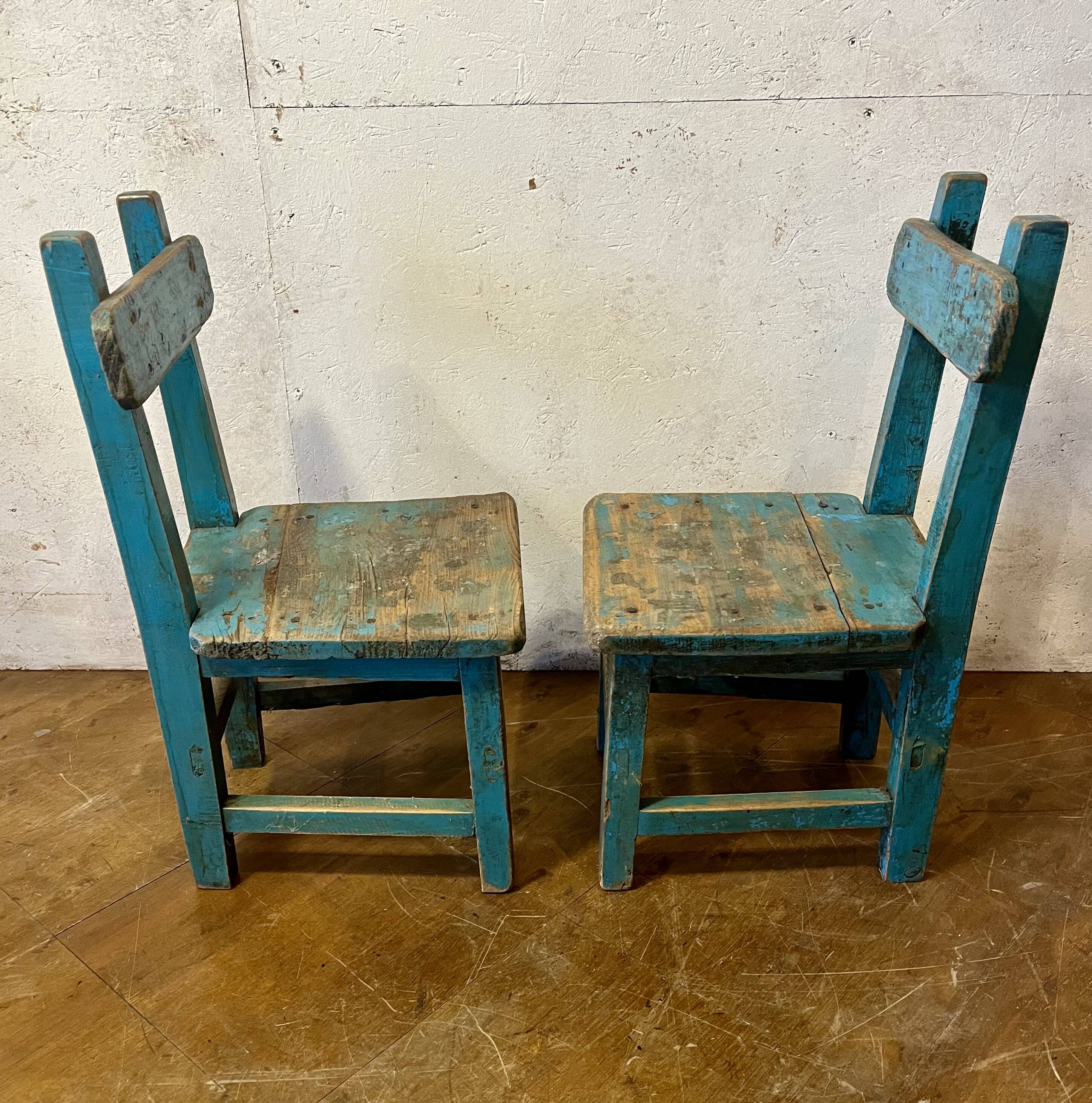 Old pair of small children's school chairs