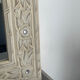 Miroir en bois sculpté