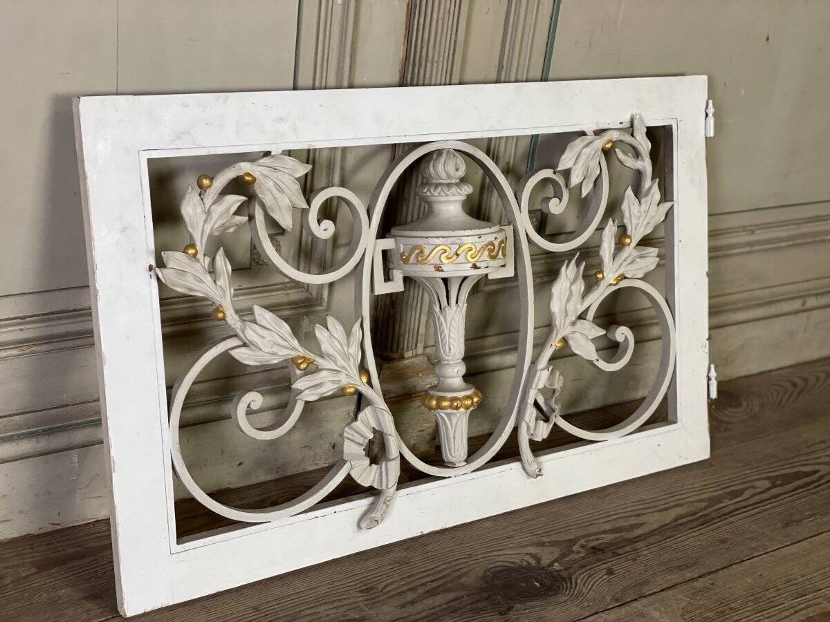 Pair of cast iron window shutters in Louis XVI style.