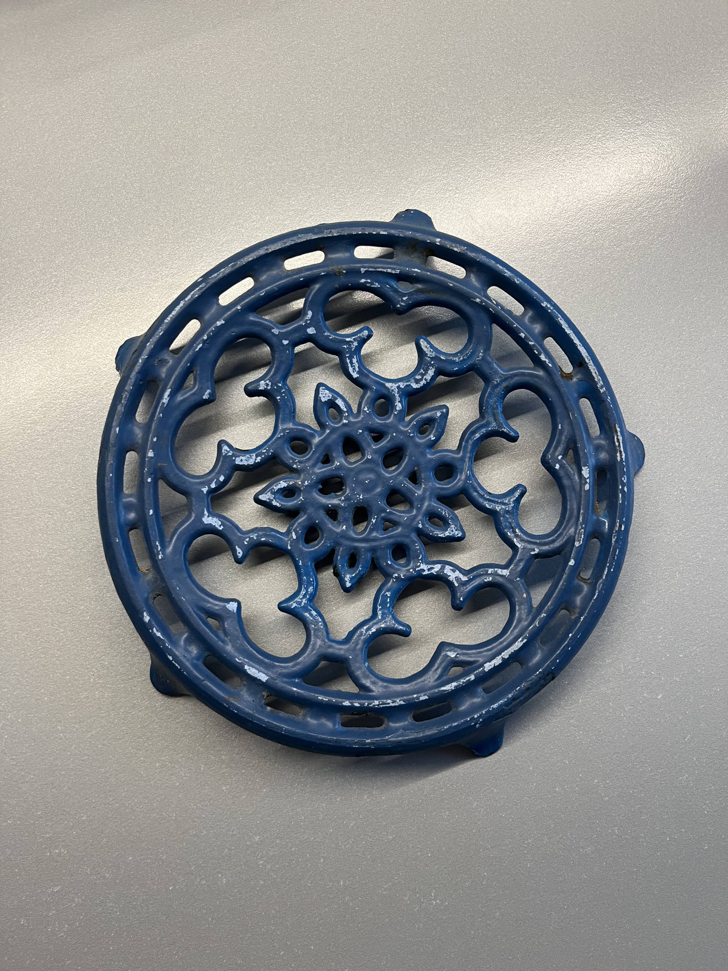 Old blue cast iron trivety
