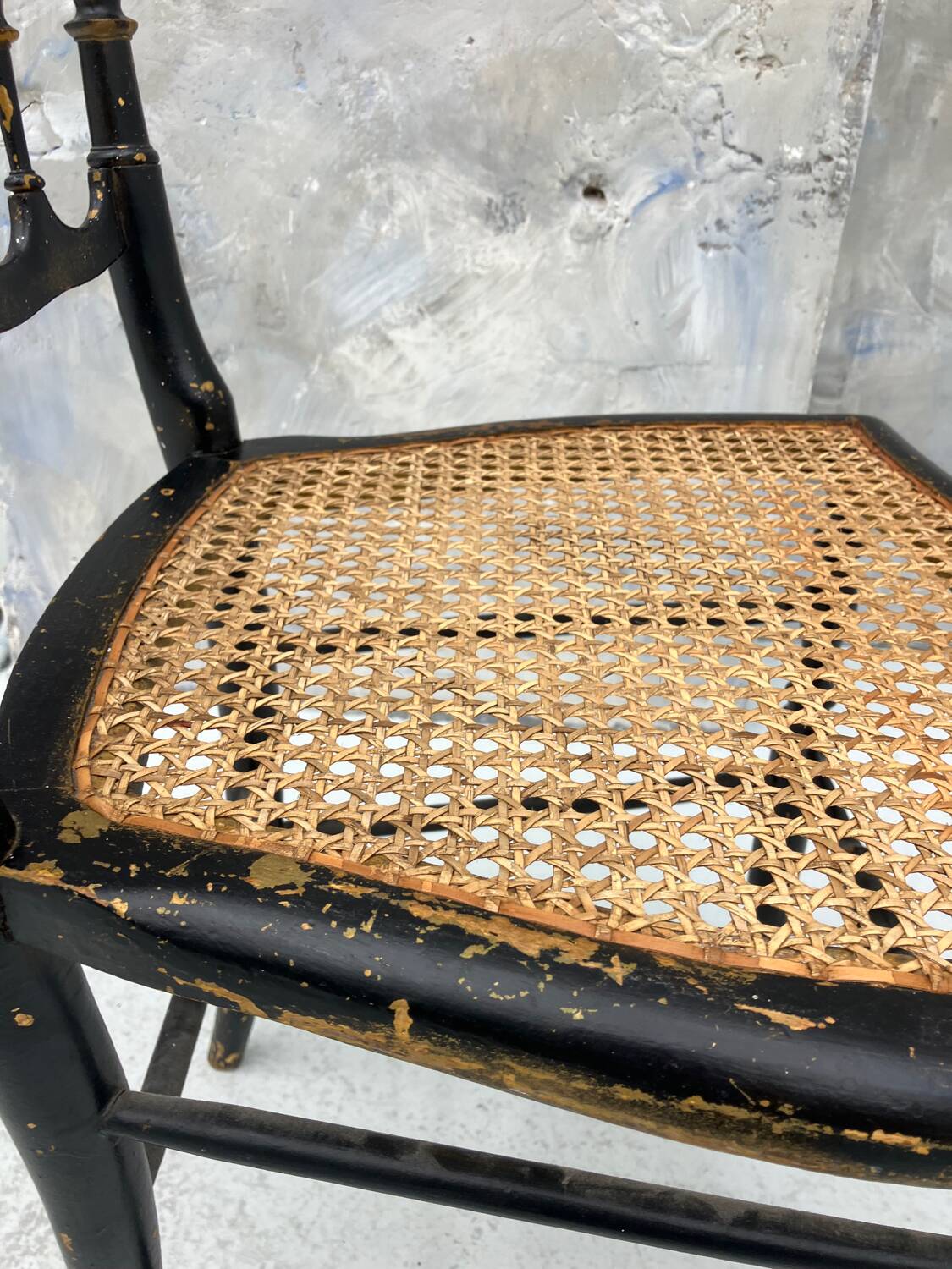 Napoleon III chair in blackened wood and cane