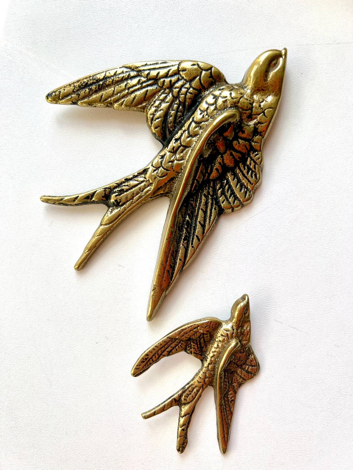 Pair of copper swallows