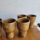Set of 8 flared glasses in brown sandstone
