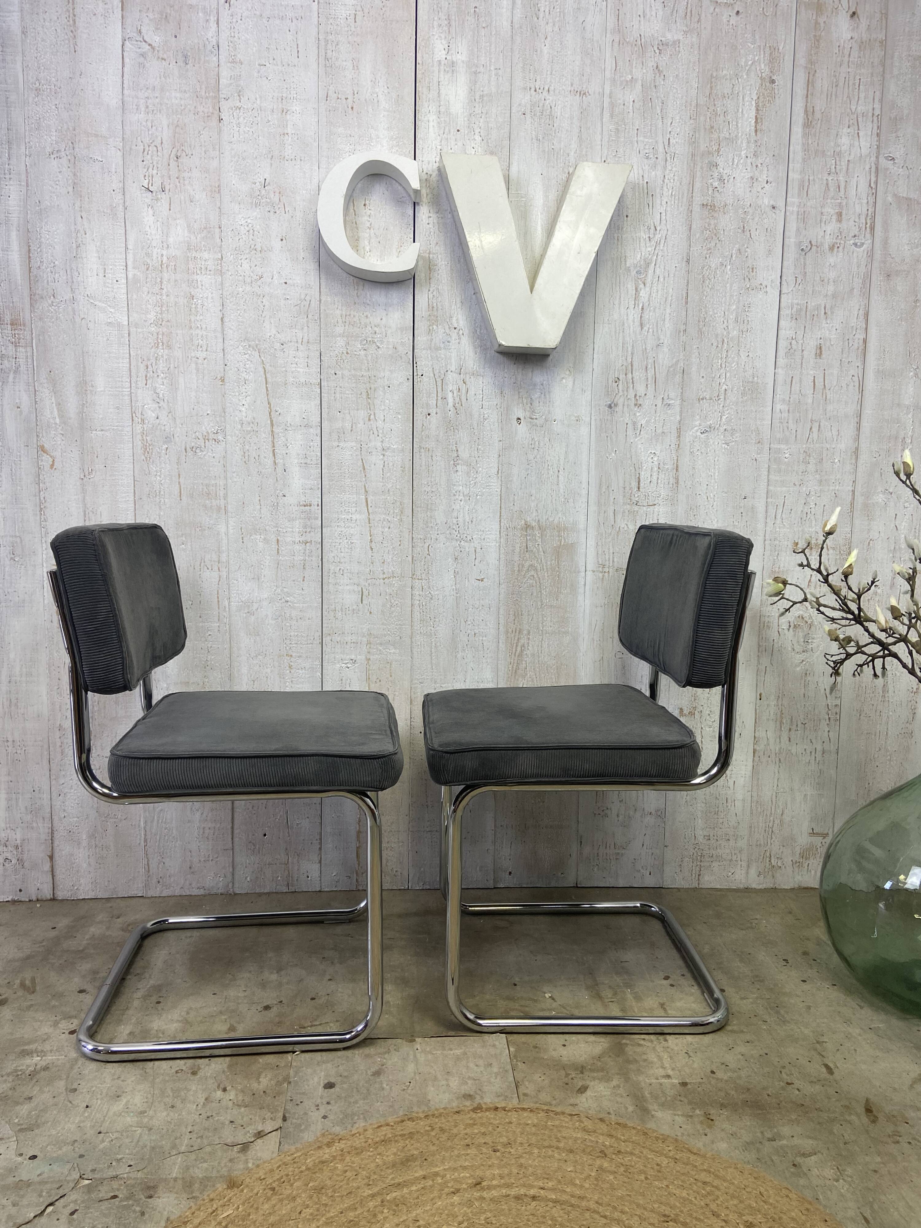 Pair of chrome and velvet chairs