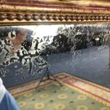 Louis Philippe's era mirror with a gold leaf pediment