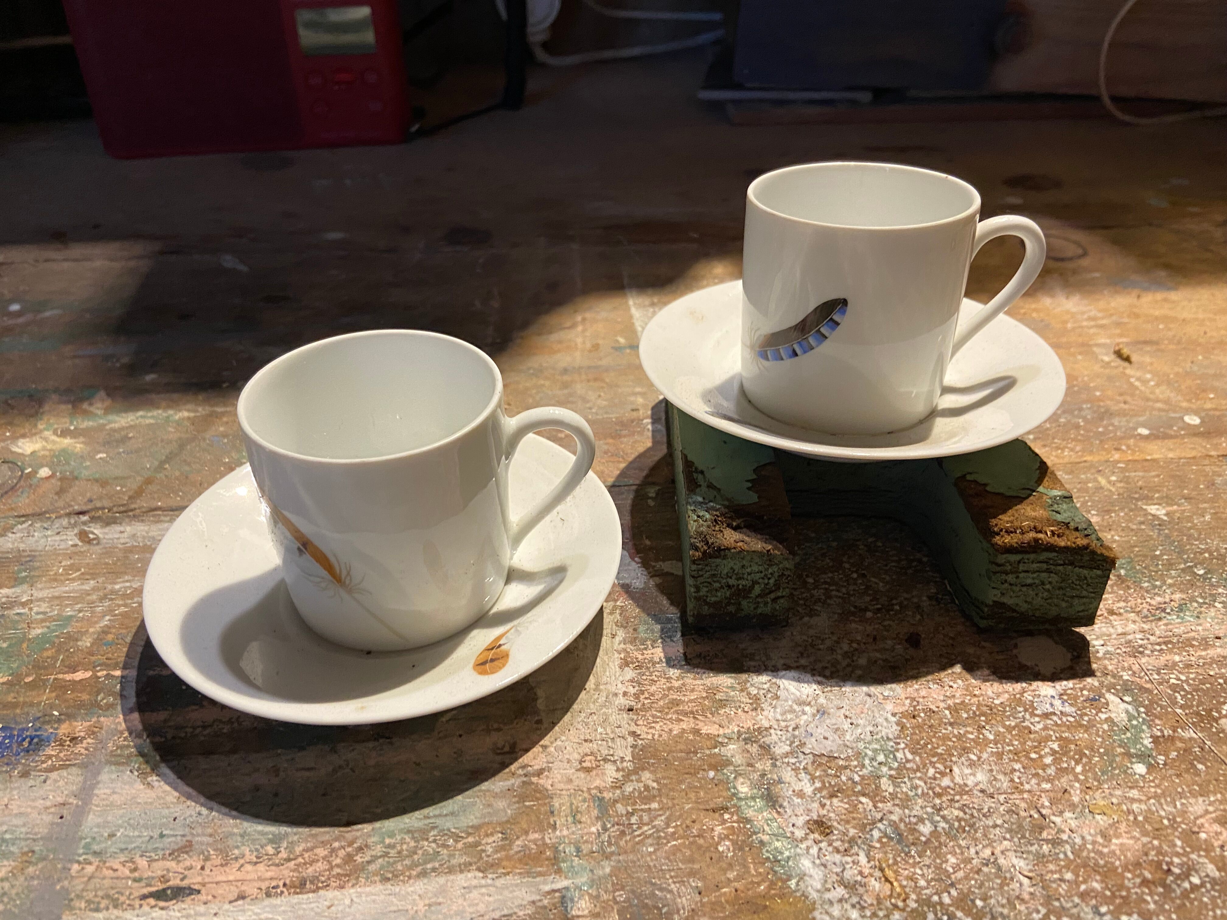 Two monastic porcelain cups