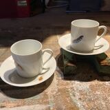 Two monastic porcelain cups