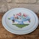 Plate with hand-painted flower bouquet on light blue background 25cm