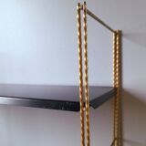 Gold metal string shelf, 1960.