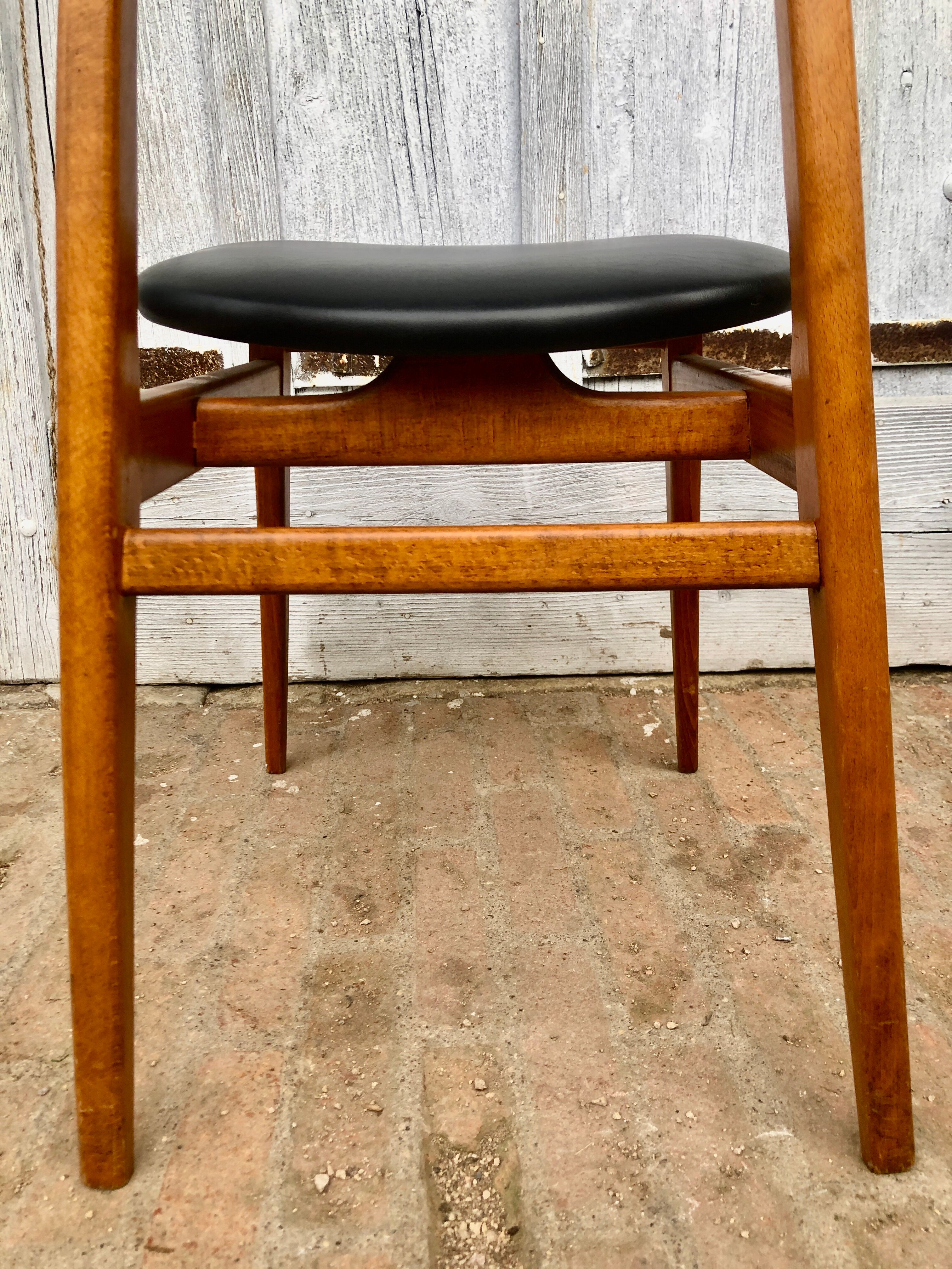 Set of 4 Scandinavian teak and black skai chairs