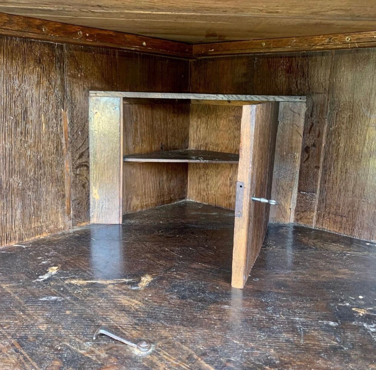 Louis Seize Oak corner cabinet with a quarter curved front