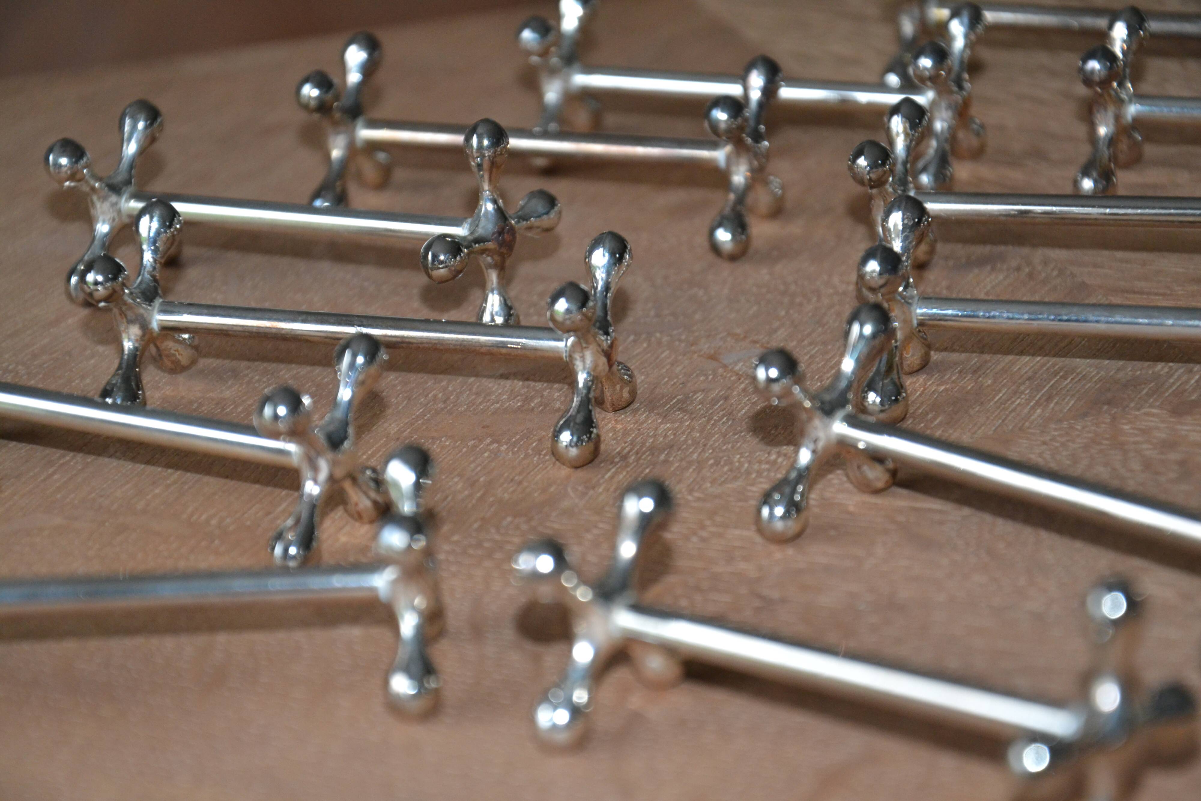 12 silver metal knife holders