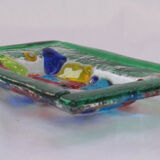 Empty millefiori-style glass pocket