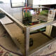 Table basse années 70  métal et verre fumé
