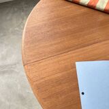 Scandinavian round teak table with extension