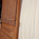 Old glazed door with its shutter