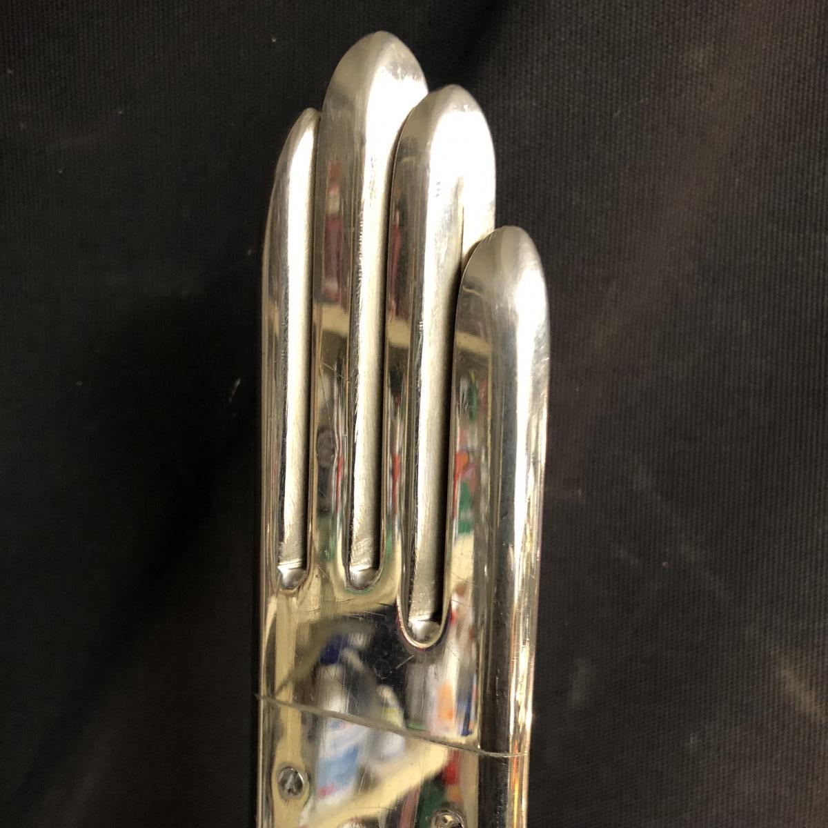 Form of Glover in chromed metal 1940 man hand