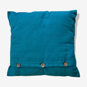 Coussin vert scandinave avec boutons en bois