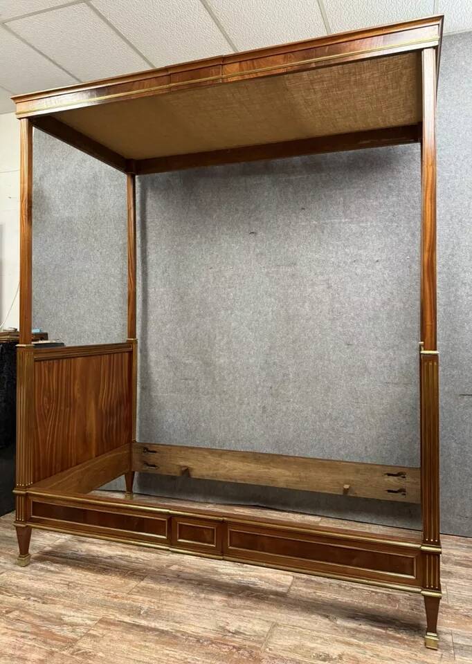 Parisian Louis XVI style four-poster bed in mahogany and gilded bronze circa 1850