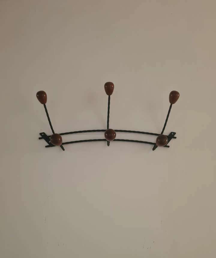 Wooden wrought iron hooks