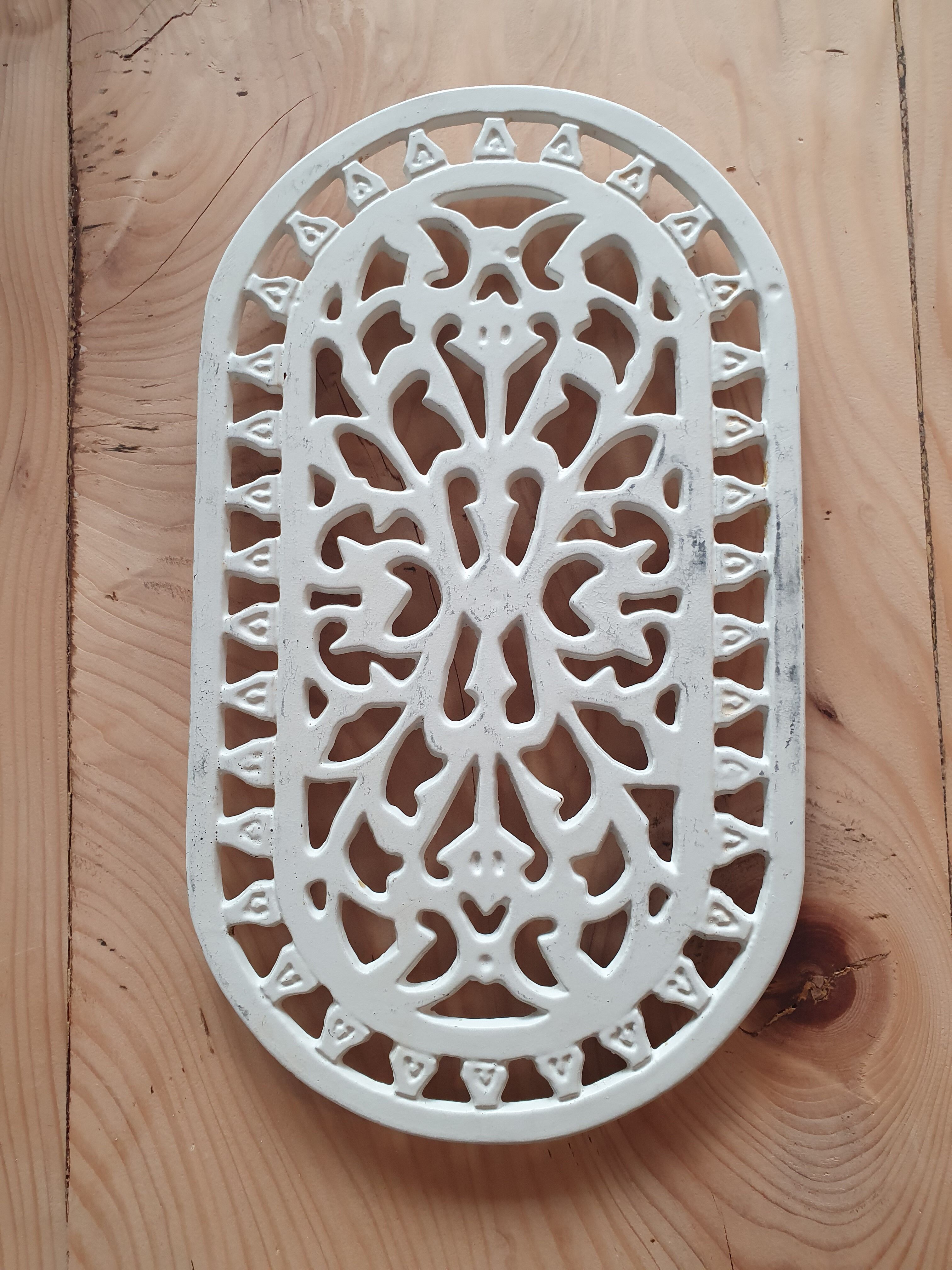 Dessous de plat en fonte