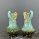 Pair of Art Nouveau vases in glazed ceramic with floral decoration, 20th Century