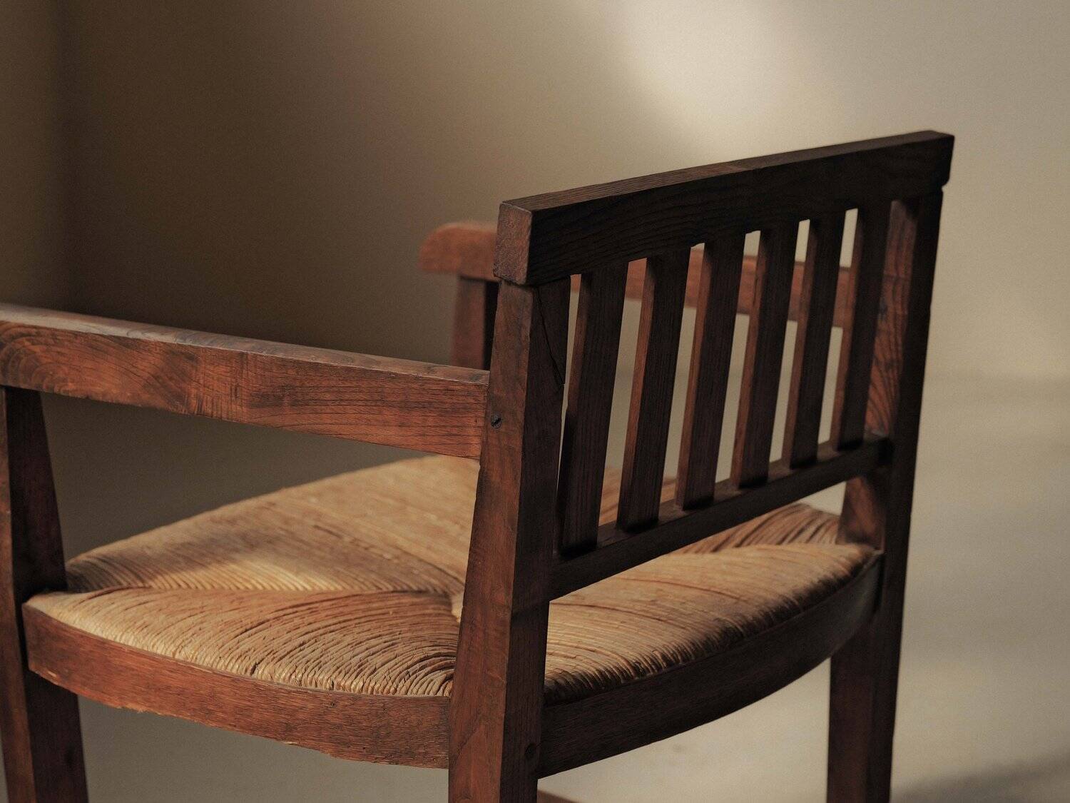 Handcrafted oak and straw armchair, France, circa 1950.