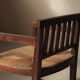 Handcrafted oak and straw armchair, France, circa 1950.