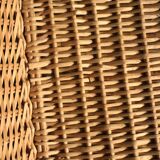 A large vintage rectangular wicker basket