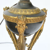 Lamp in gilded bronze and black lacquered metal