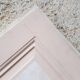 Porte ancienne en bois patine beige