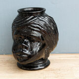 Molded glass vase, nubian's head