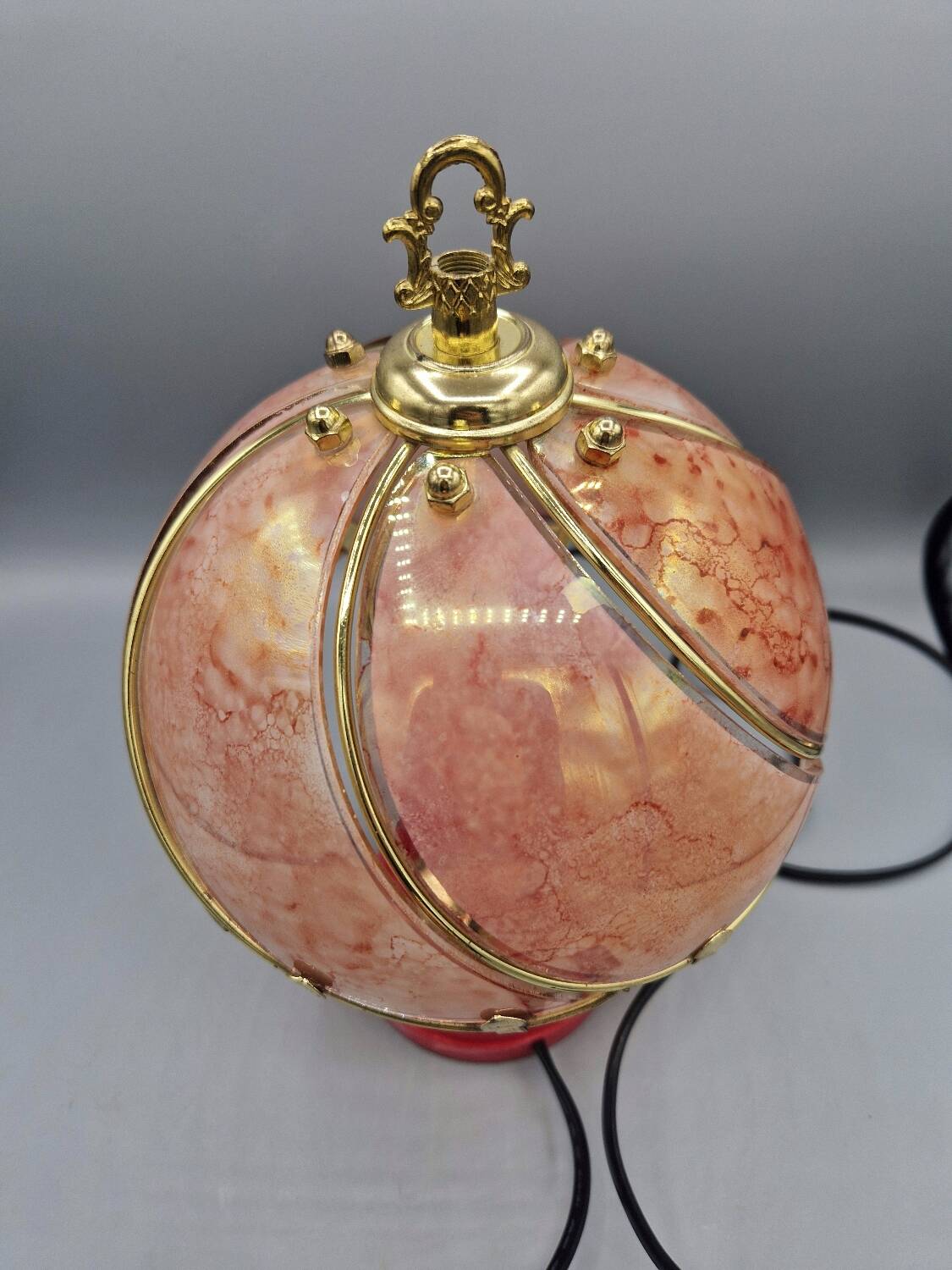 Vintage pink glass globe lamp with brass details and pink base