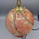 Vintage pink glass globe lamp with brass details and pink base