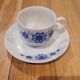 4 vintage coffee cups and their saucers