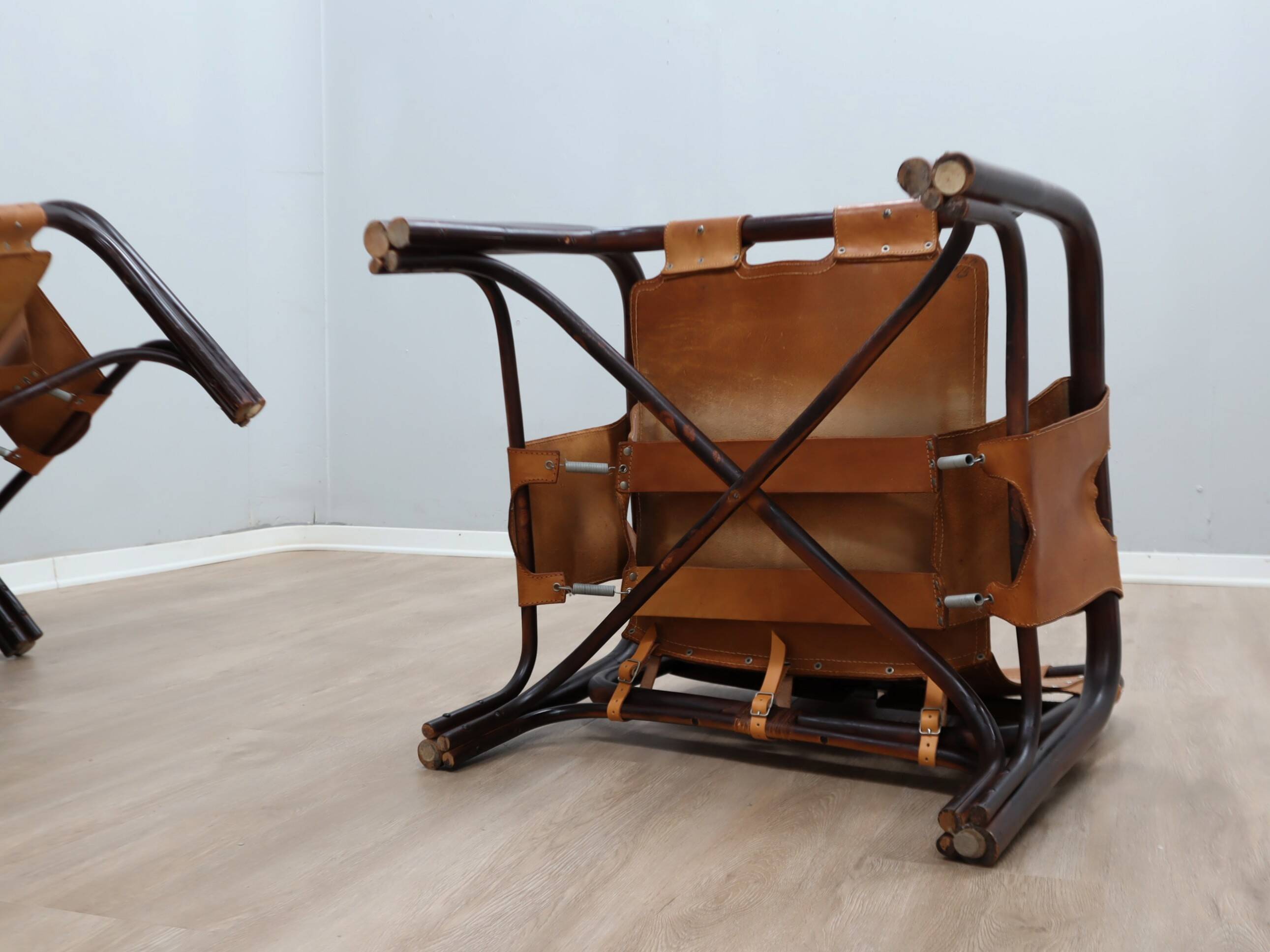 A vintage Tito Agnoli armchair leather and bamboo 1960s
