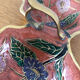 Empty pockets in brass and floral decoration